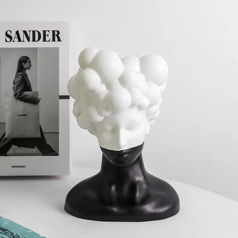 Clouded Reverien Statue