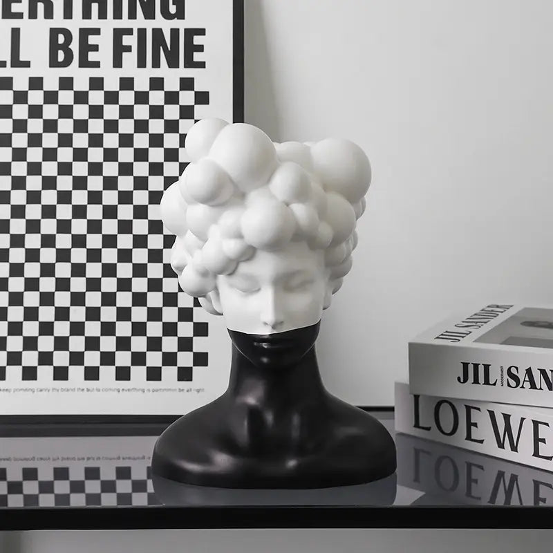 Clouded Reverien Statue